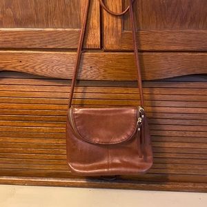 Magellan’s brown leather crossbody